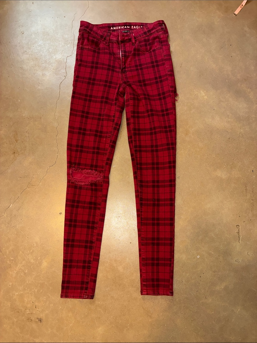 American Eagle Red Plaid Skinny Jeans with cheeky backside distressed